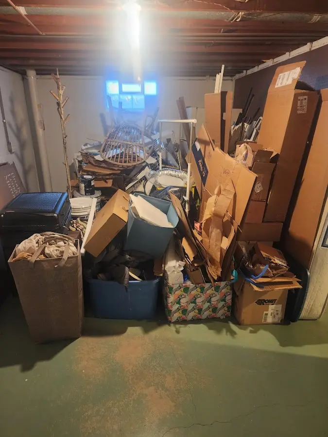 Roll-off dumpster container at job site for 15 Yard Dumpster Rental in Oxford